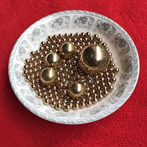 Plate of 15.8mm 20pcs Solid Pure Copper Balls - Brass Ball Bead, showcasing shiny copper beads, suitable for machinery and art projects.