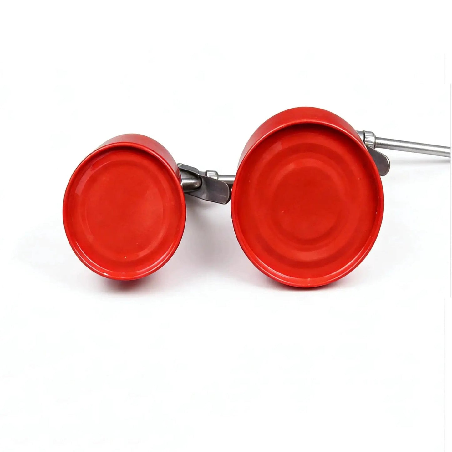 Bottom view of two red metal caps of Red 250ml Hand Pump Oil Can With Straight Spout High Pressure Metal Oiler Bottle For Precise Lubrication