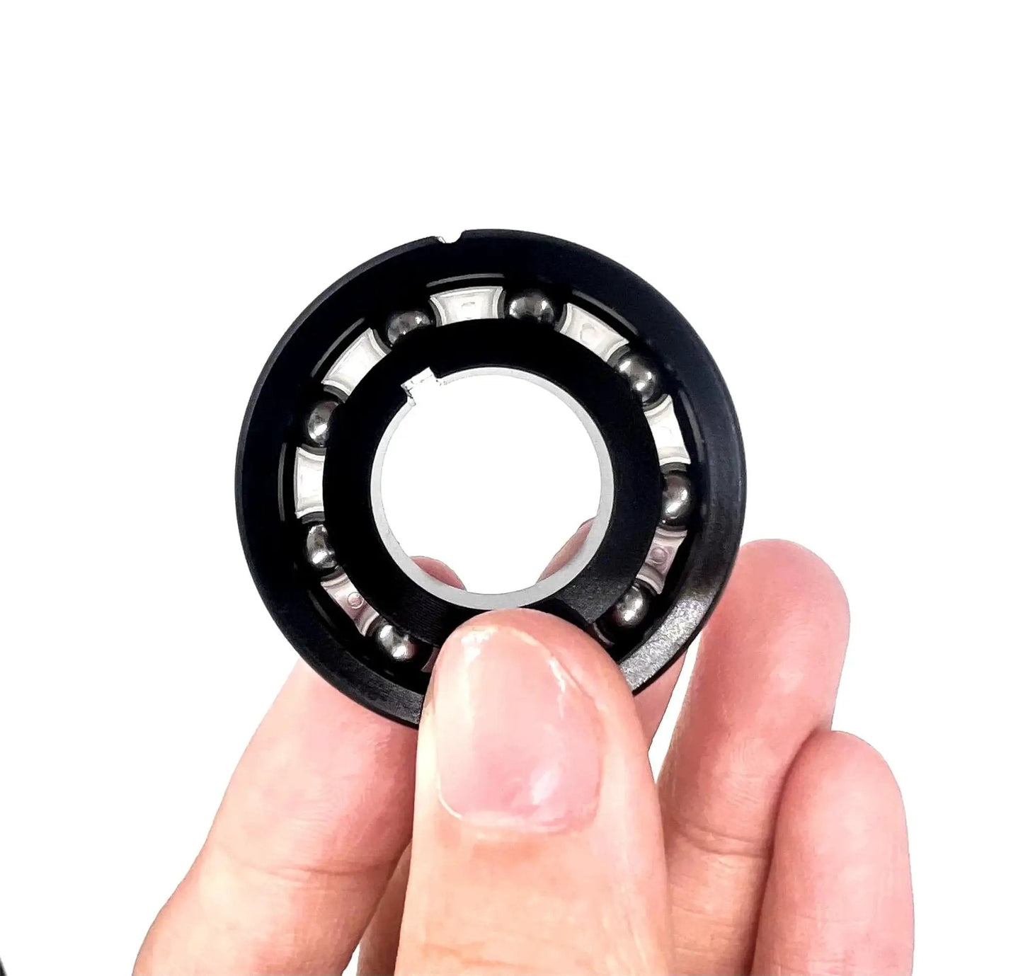 High Efficiency Turbine Bearing Replacement For Navigator Pool Vacuum Cleaners AXV055P 4 Pack being held for detail view