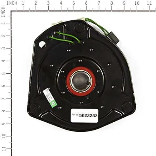 Top view of Briggs and Stratton 5023233SM Electric Clutch with size scale, showing black metal construction
