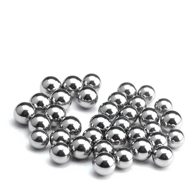Pile of One Quarter Inch Chrome Steel Bearing Balls G25 Precision 100 Pcs High Hardness Wear Resistant Durable on white background.