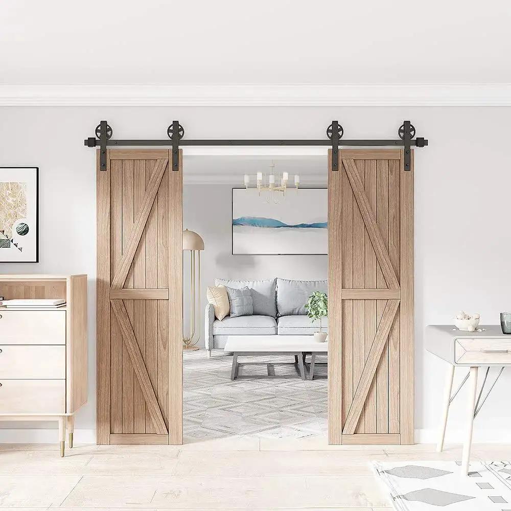 Premium Black Finish Wood Double Sliding Barn Door Hardware Kit With Big Spoke Wheel Rollers installed in a living room