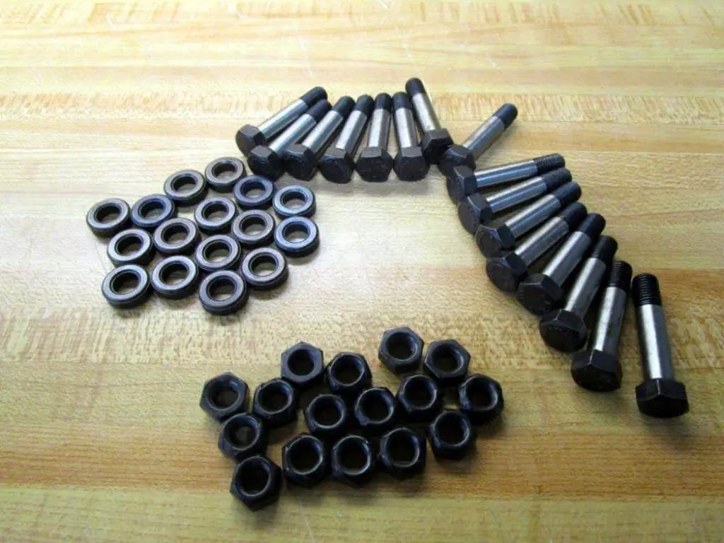 NPT Pipe Fitting Kit With 5/16-18 Fine Thread 316321 Stainless Steel PKIT SN 226 STL components on wooden surface