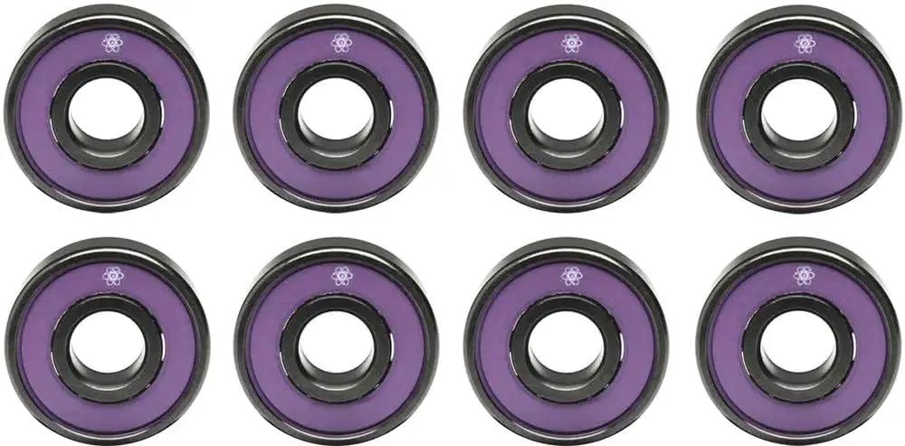 High Performance Skate Bearings Pack Of Eight With Stackz Graphflo Cream Lubricant Made In The USA for smooth spins, purple color front view.