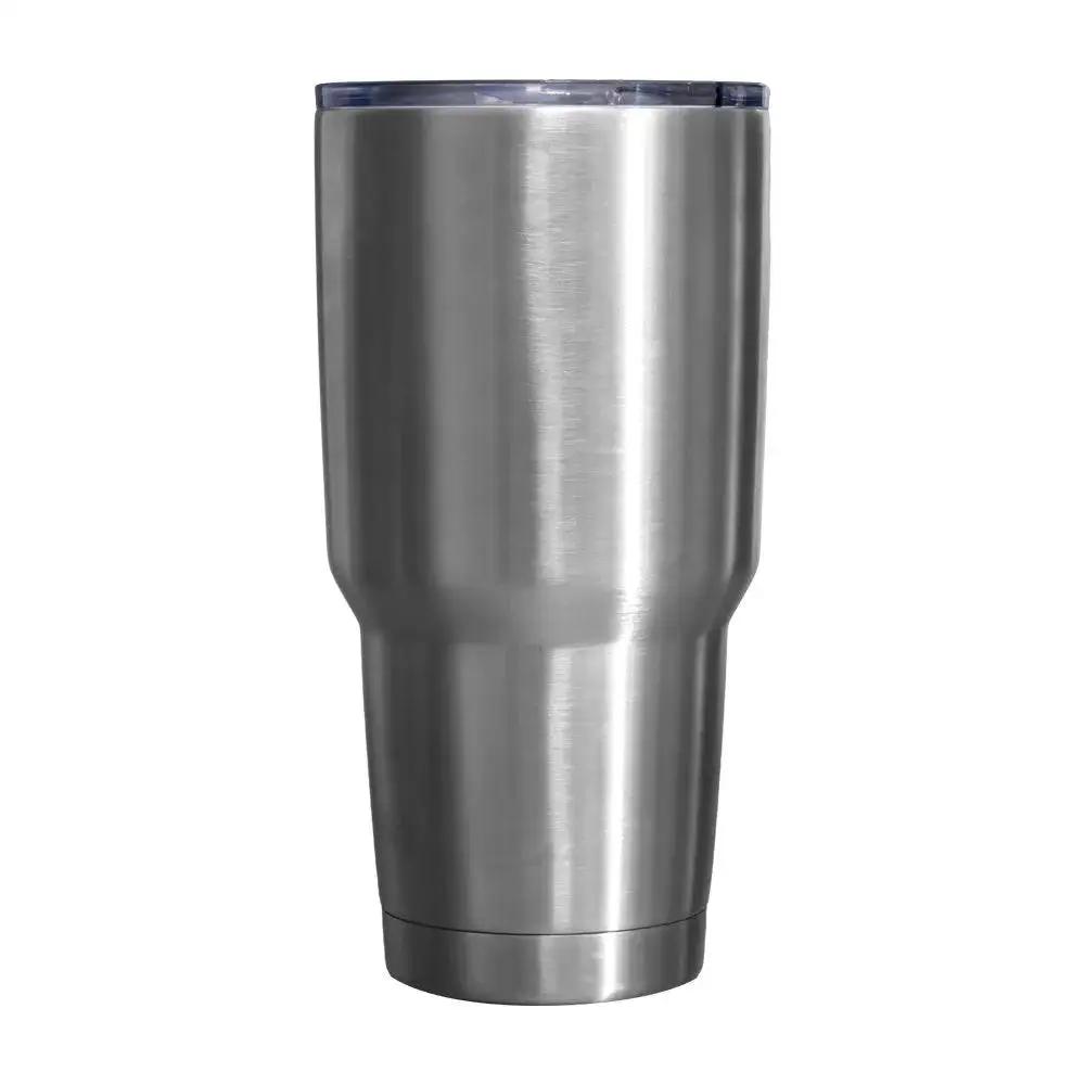Stainless steel tumbler with clear lid on white background