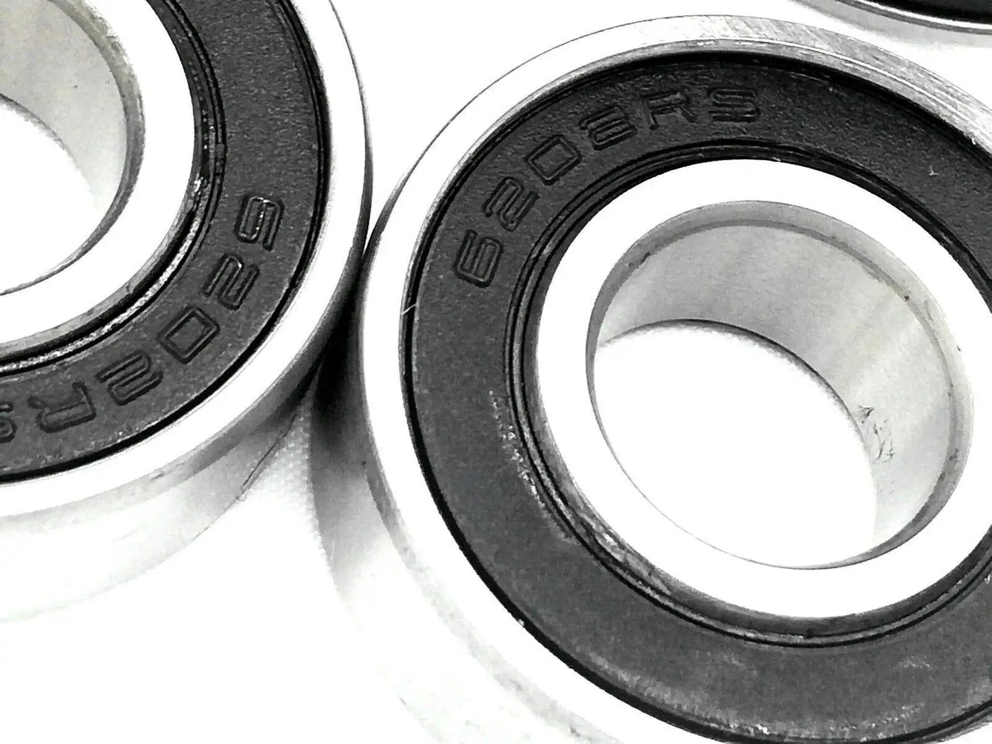 Close-up of 4 Pack Front And Rear Wheel Bearing Set For Coleman CT200U CT200U EX And Baja MB165 MB200 Mini Bikes 6202 RS Bearings