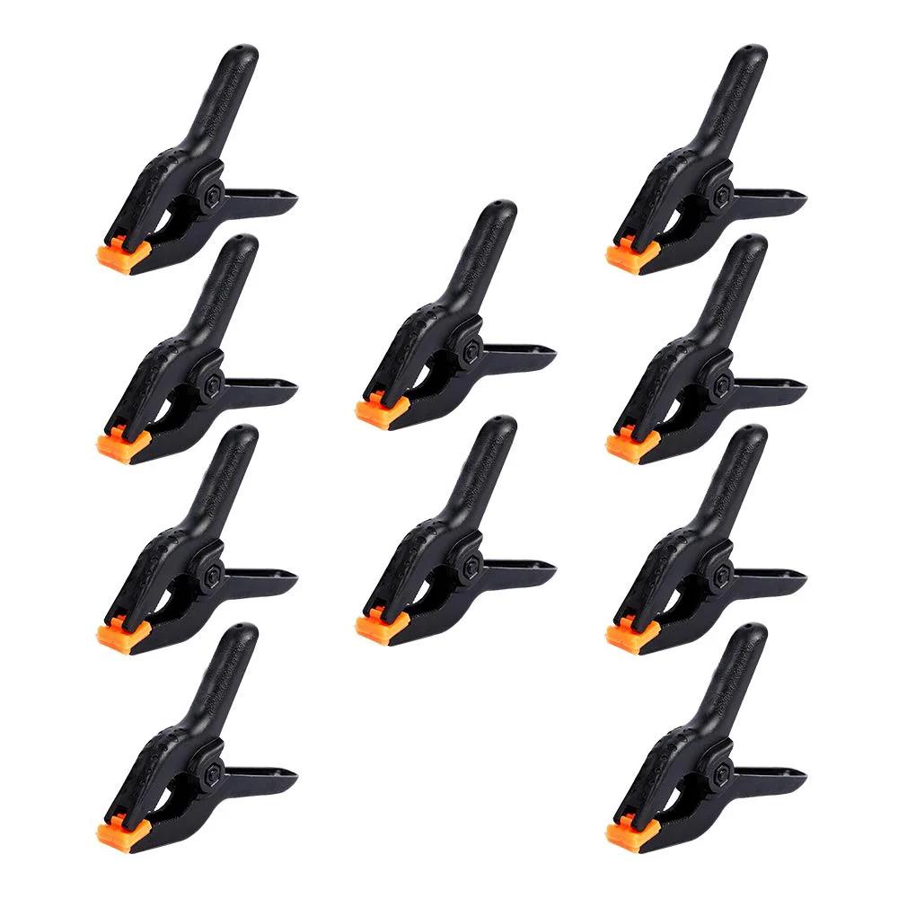10 Pack 4.5 Inch Heavy Duty Plastic Spring Clamps for Crafts and Photography Backdrops, large nylon clips with black design.