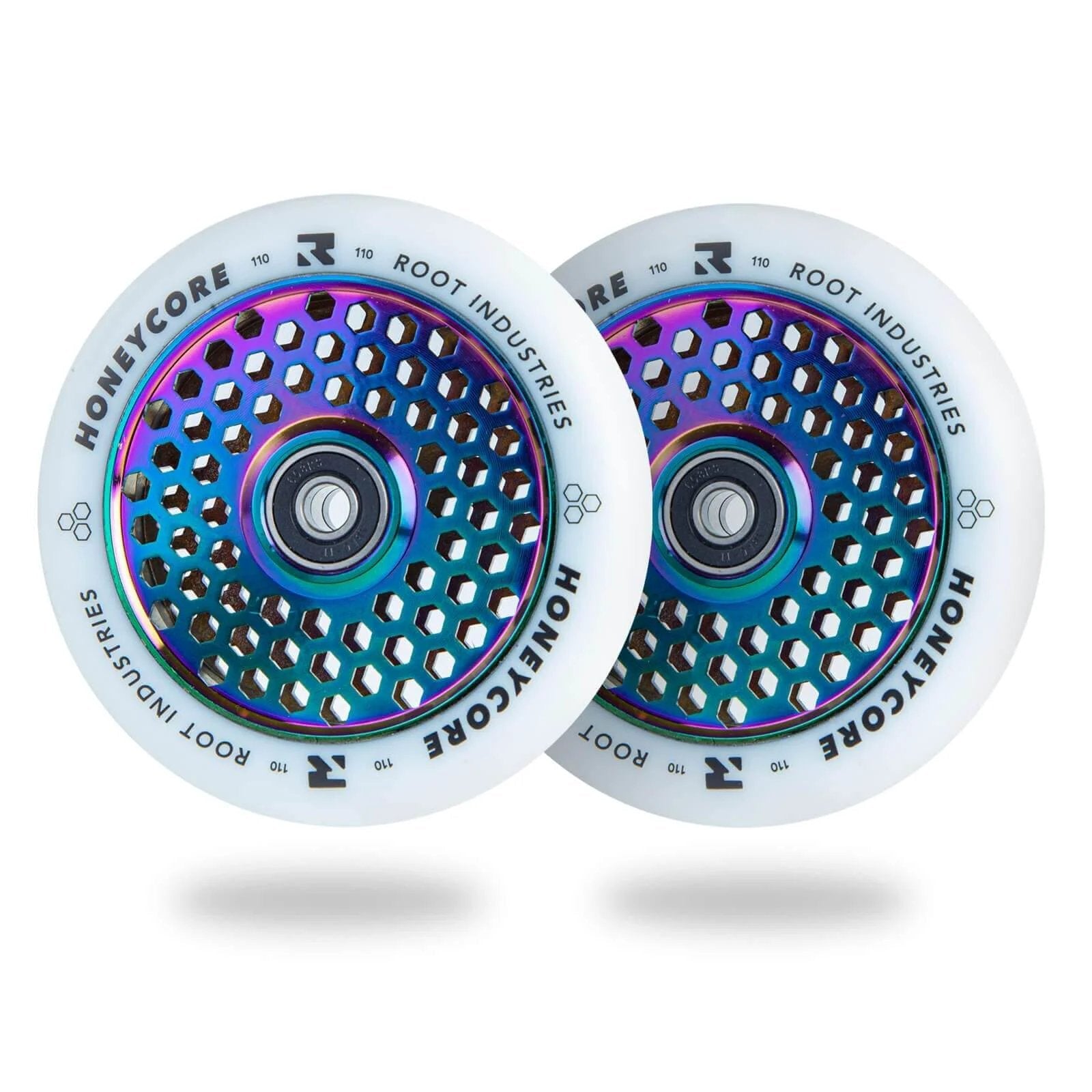 110mm Pro Scooter Wheels Pair White Rocket Fuel with Bearings Installed, lightweight design, shown with decorative honeycomb centers