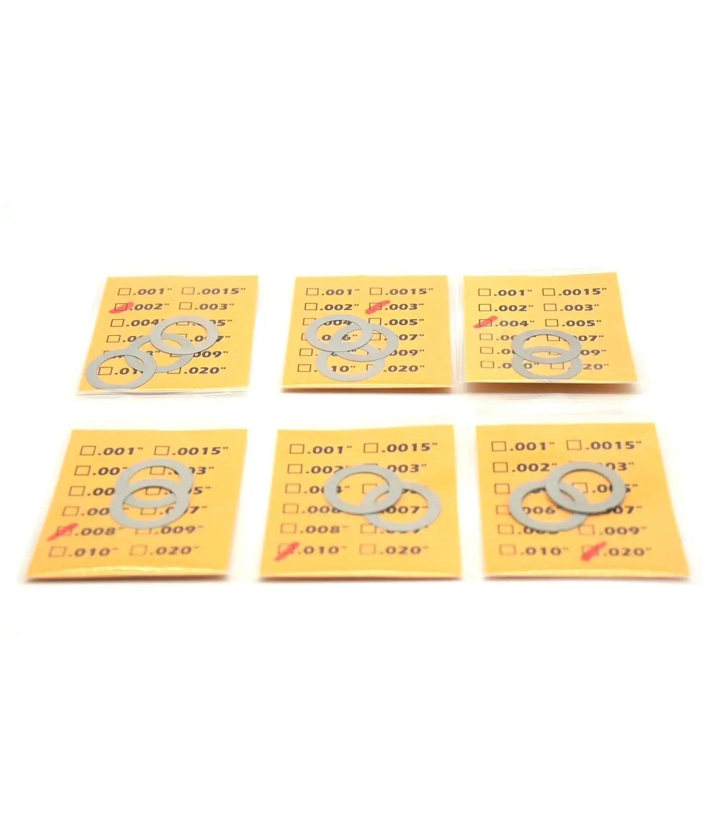 14 Pack Half Inch 28 TPI Barrel Shim Kit for .223 and 5.56 Muzzle Brakes displayed in clear segmented packaging, showing various thicknesses.