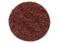 Red circular scouring pad with porous texture, suitable for cleaning and scrubbing surfaces.