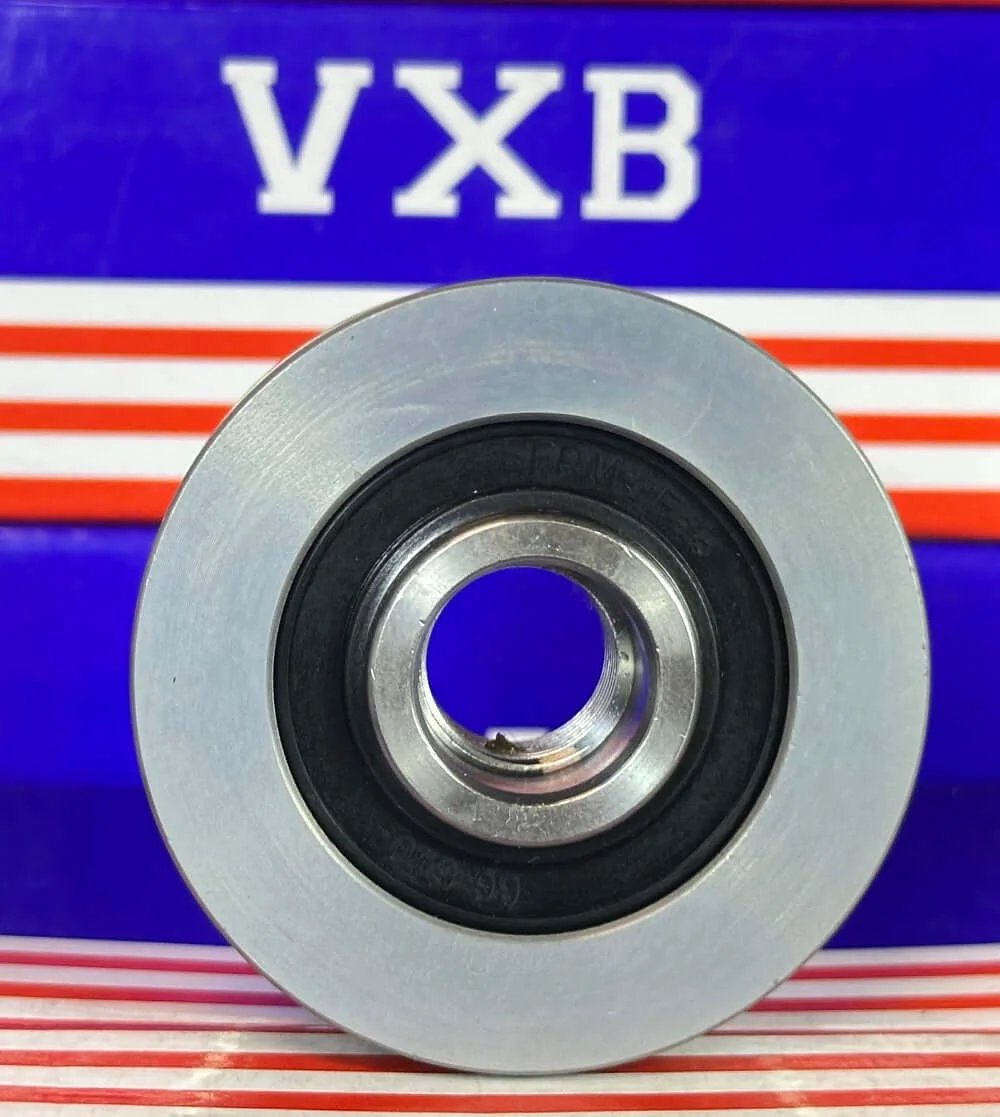 F‑557565 Alternator Freewheel Pulley 5 Groove, 55 mm OD 535016110 viewed from the front with a shiny aluminum finish.