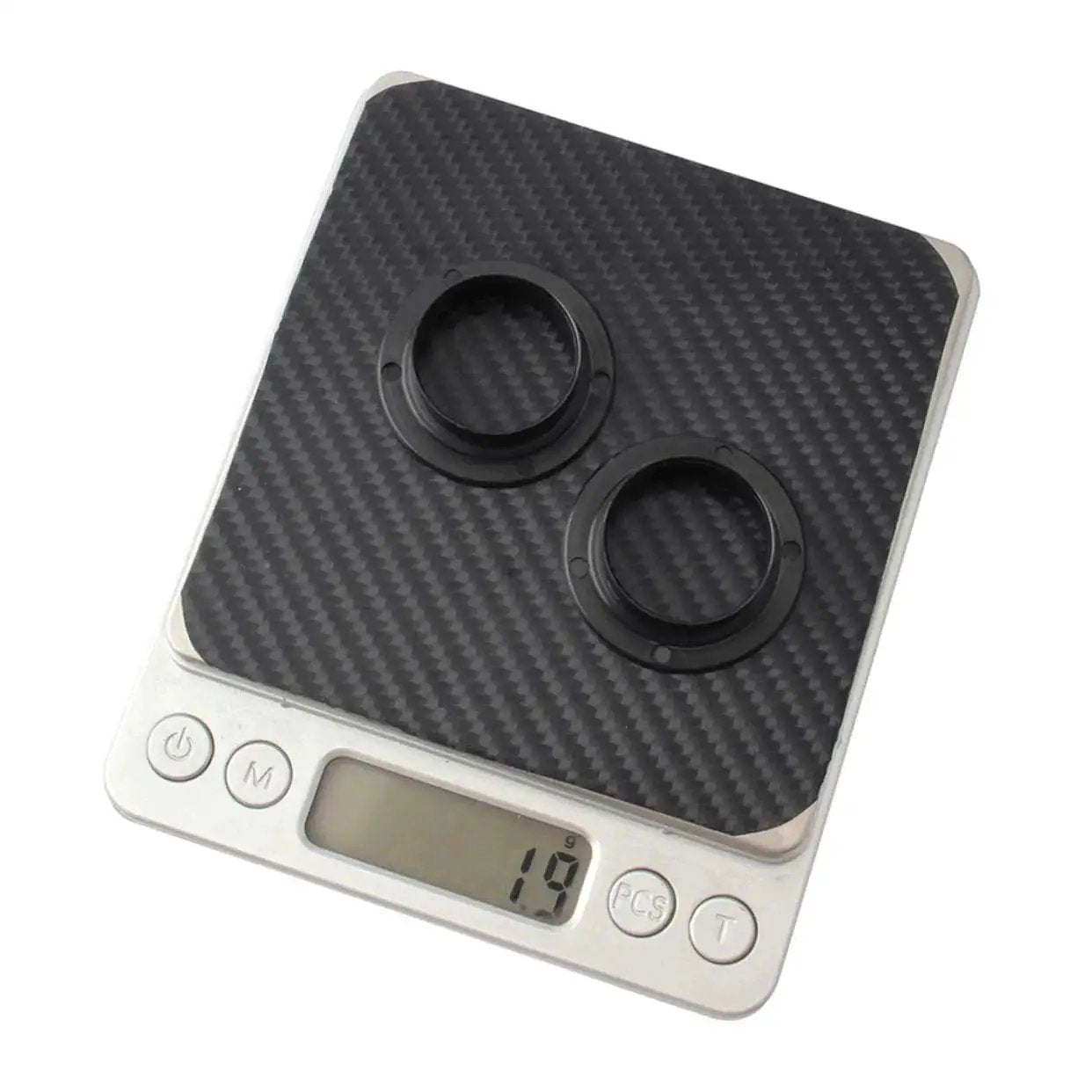 Two Pack Black Axle Protection Covers for Bike Bearings Dust Covers on digital scale
