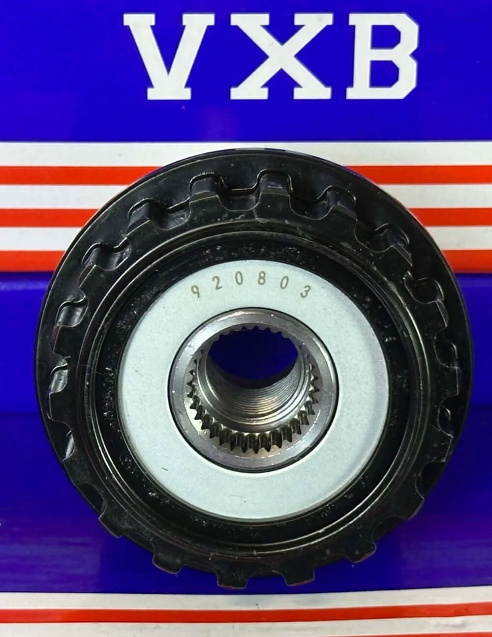 Close-up view of 920803 Overrunning Alternator Decoupling Pulley for Land Rover (2008-2010) showing gear-style design.