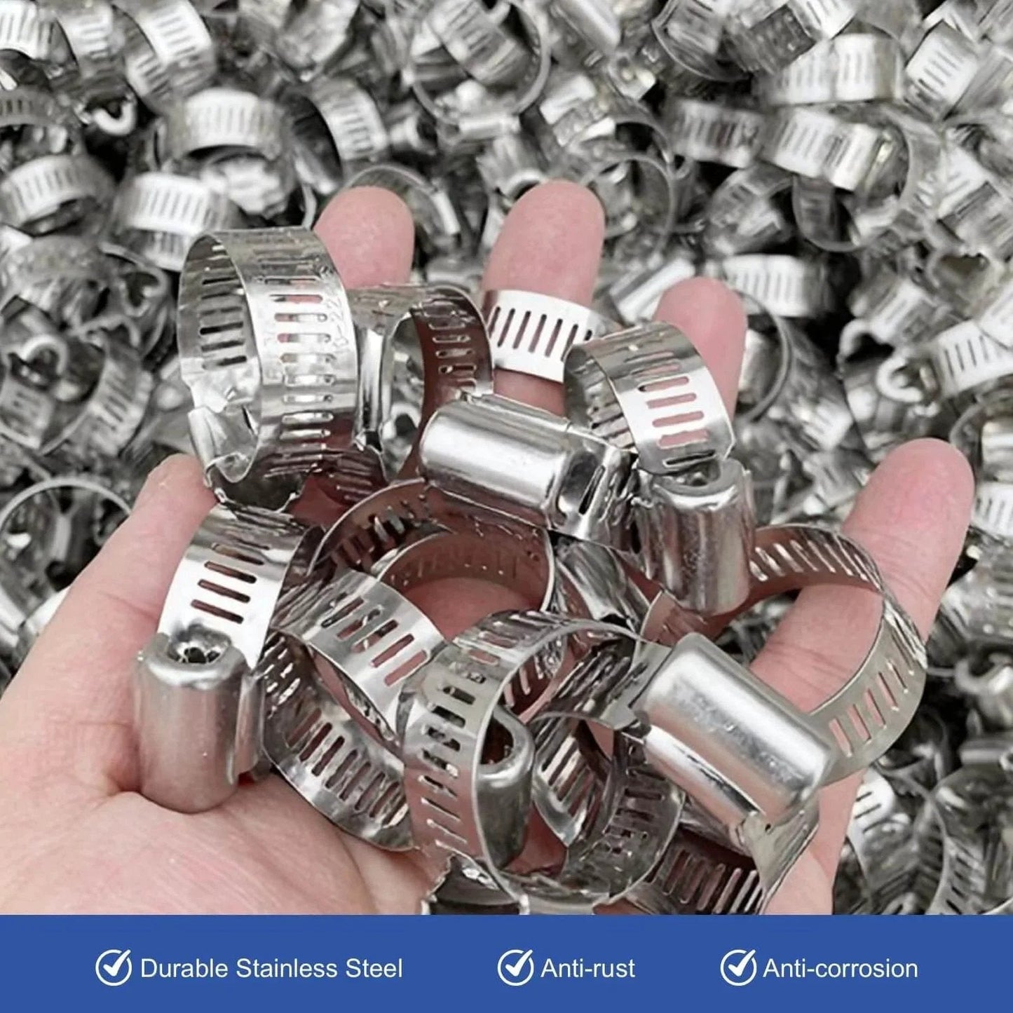 Hand holding 40 Piece Hose Clamp Set With 304 Stainless Steel Assortment From One Quarter Inch To One And One Eighth Inch Small Worm Gear Clamps Kit For Automotive Fuel Line Plumbing Mechanical Applications Marine And Home Improvement