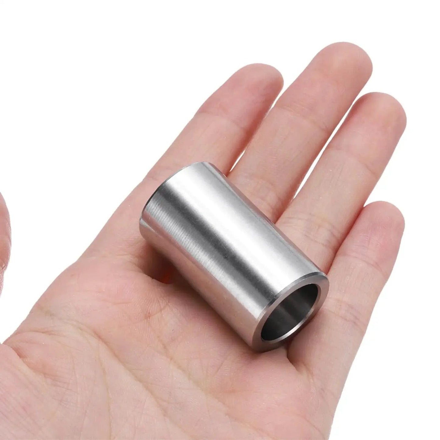 Hand holding a Stainless Steel Spacer 5/8 Bore 7/8 OD 1-1/2 Length, 304 stainless round metal standoff bushing plain finish.