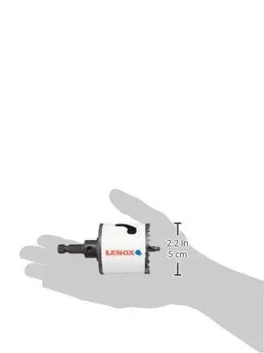 Hand holding Built Tough Bi Metal Hole Saw With Speed Slot For Metal 2-1/8 Inch Arbored 50 Percent Longer Life By LENOX.