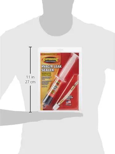 HVAC Leak Stop Syringe With Application Hose 2 Oz 60 Ml Universal Fit Not For Automotive Use Permanently Seals Leaks In A C And Refrigeration Systems Non Polymer Formula That Protects Against Corrosion TSI Supercool 28399 package held against silhouette background