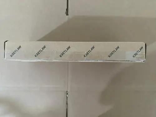 Top view of a cardboard box labeled with 'Kretlaw' text, possibly used for packaging automotive products.