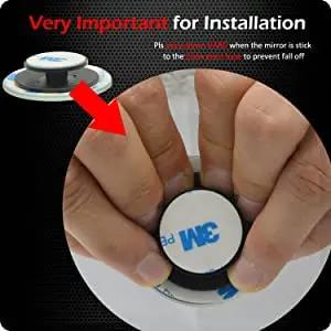 Close-up of hands installing adhesive for Blind Spot Mirror 2 Inch Round HD Glass Frameless Convex Rear View Mirror Pack Of 2.