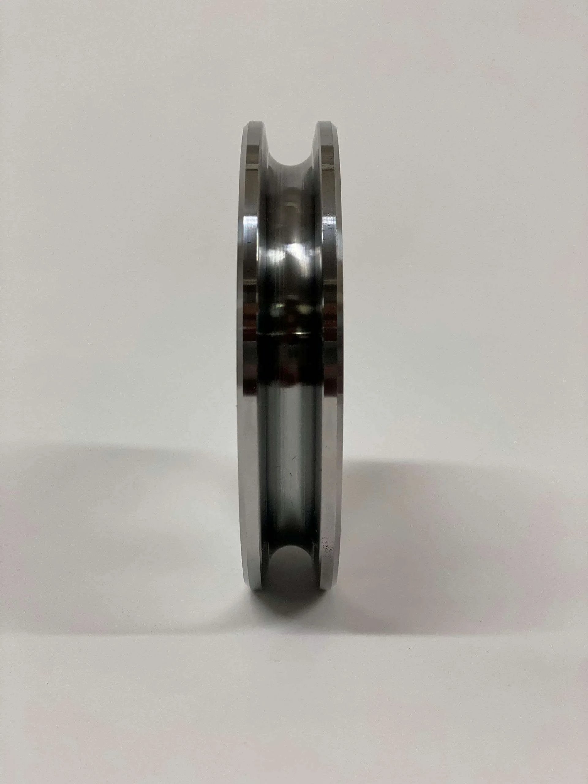 Side view of Auto Lift Parts Steel Cable Sheave 4" Pulley with 3/4" Center Hole, upgraded from nylon OEM, for 2-post lift, steel body.