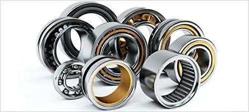 Various sealed ball bearings including Single BFX205-14 Mounted Insert - Sealed Ball Bearing 14mm ID for industrial machinery use.