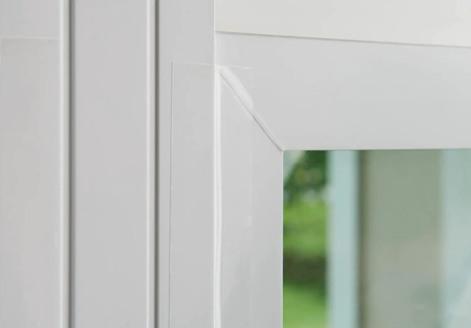 Transparent Weather Sealing Tape 1.5 in x 30 ft (Crystal Clear) Removable Insulation Tape on interior window frame.