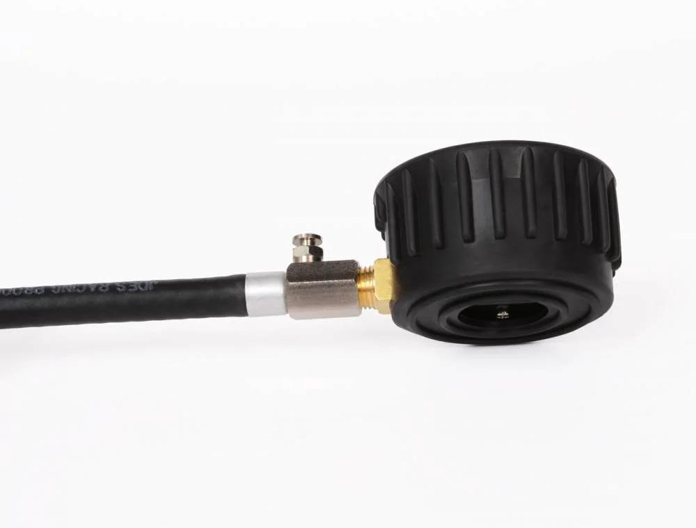 Close-up of side view of Pro Tire Gauge Glow In The Dark Analog Tire Pressure Gauge 0 To 60 PSI with durable steel housing and rubber cushion