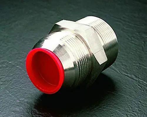 Red Tapered Cap and Plug Set for T Series LD-PE, 200 Pack installed on hydraulic fitting, showing protective dust seal.