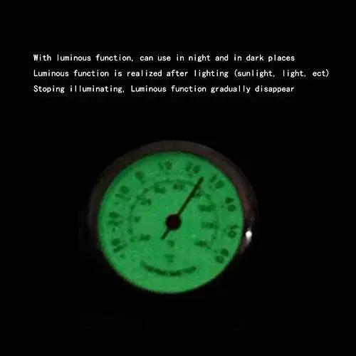 Compact Car Dashboard Thermometer with Night Glow Clip for Air Vent showing luminous glow in dark setting.