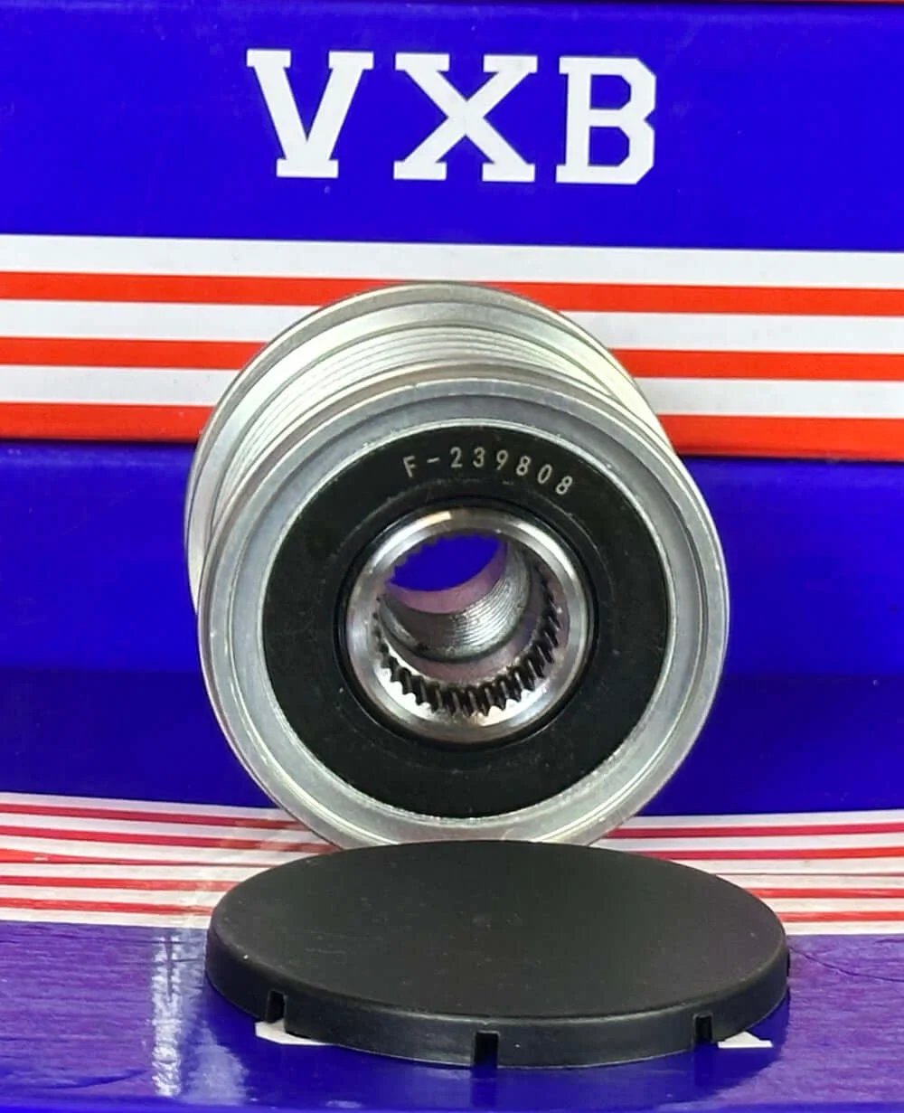 F‑239808 Alternator Freewheel Clutch Pulley 7 Groove, 17 mm Bore 535014010 front view with bearing and cap.