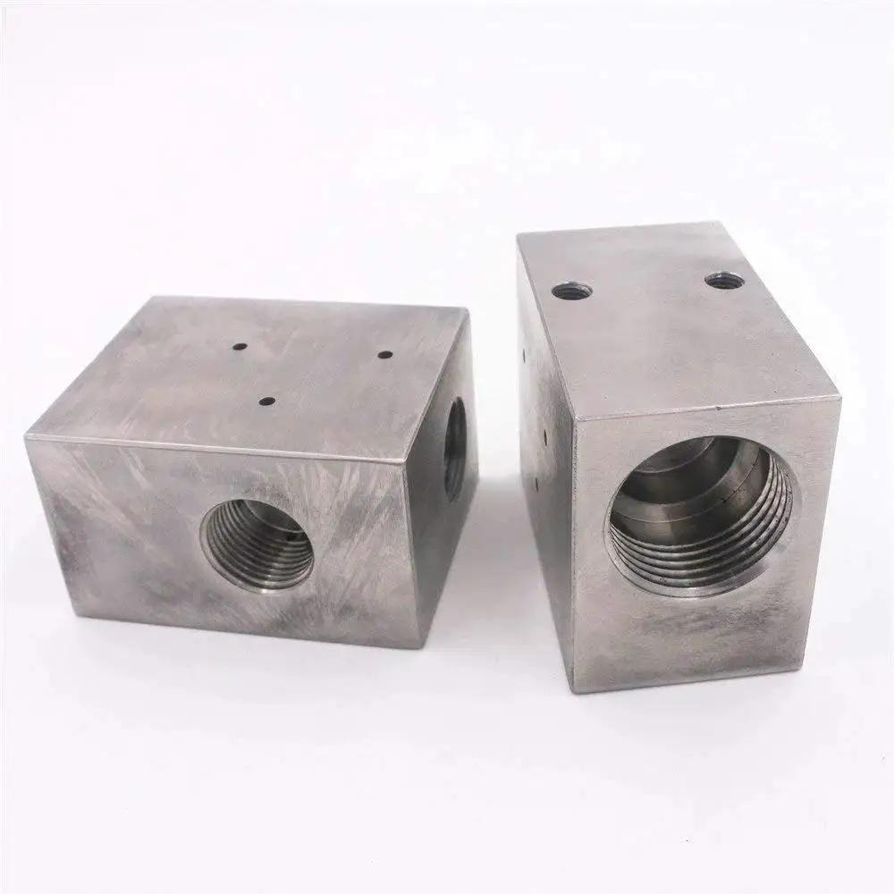 Pneumatic Valve Body No 10189181 for Waterjet Cutting Machines shown with threaded openings, metal construction, for precision cutting.