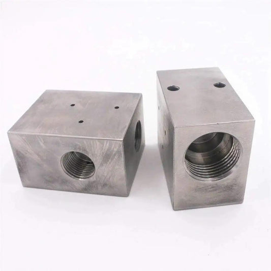 Pneumatic Valve Body No 10189181 for Waterjet Cutting Machines shown with threaded openings, metal construction, for precision cutting.