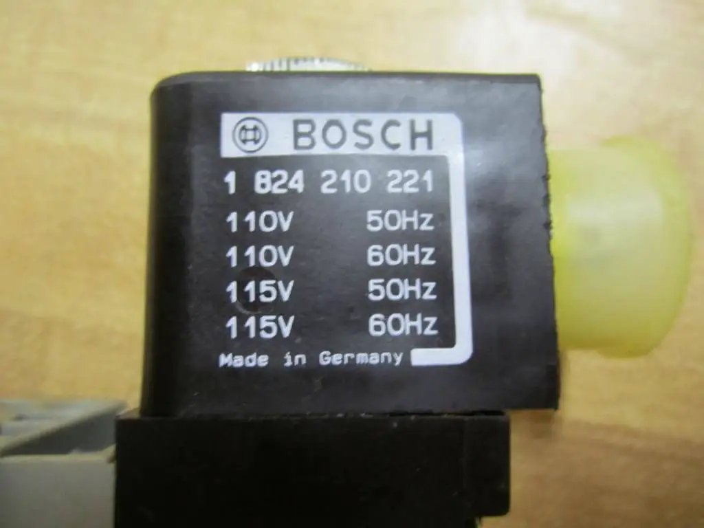 Directional control valve 0 820 027 128 solenoid showing voltage and frequency for 110V/115V 50/60Hz coil