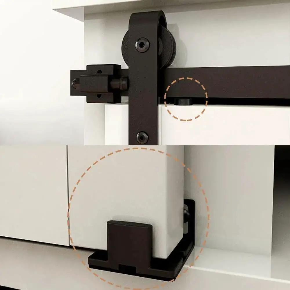 Two And A Half Foot Sliding Barn Door Hardware Kit For Single Door TV Stands And Small Cabinets J Shaped Hanger System With Carbon Steel Track Frosted Black Finish Stainless Steel Wheel Bearings And Nylon Rollers For Quiet Smooth Operation No Cabinet, close-up of installed hardware on white cabinet