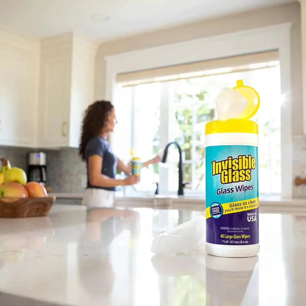 Container of Pack Of 3 Pre-Moistened Glass Wipes, Streak-Free And Lint-Free For Windows on kitchen counter