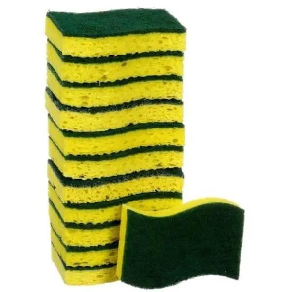 Stack of green and yellow kitchen scrub sponges with a scouring pad