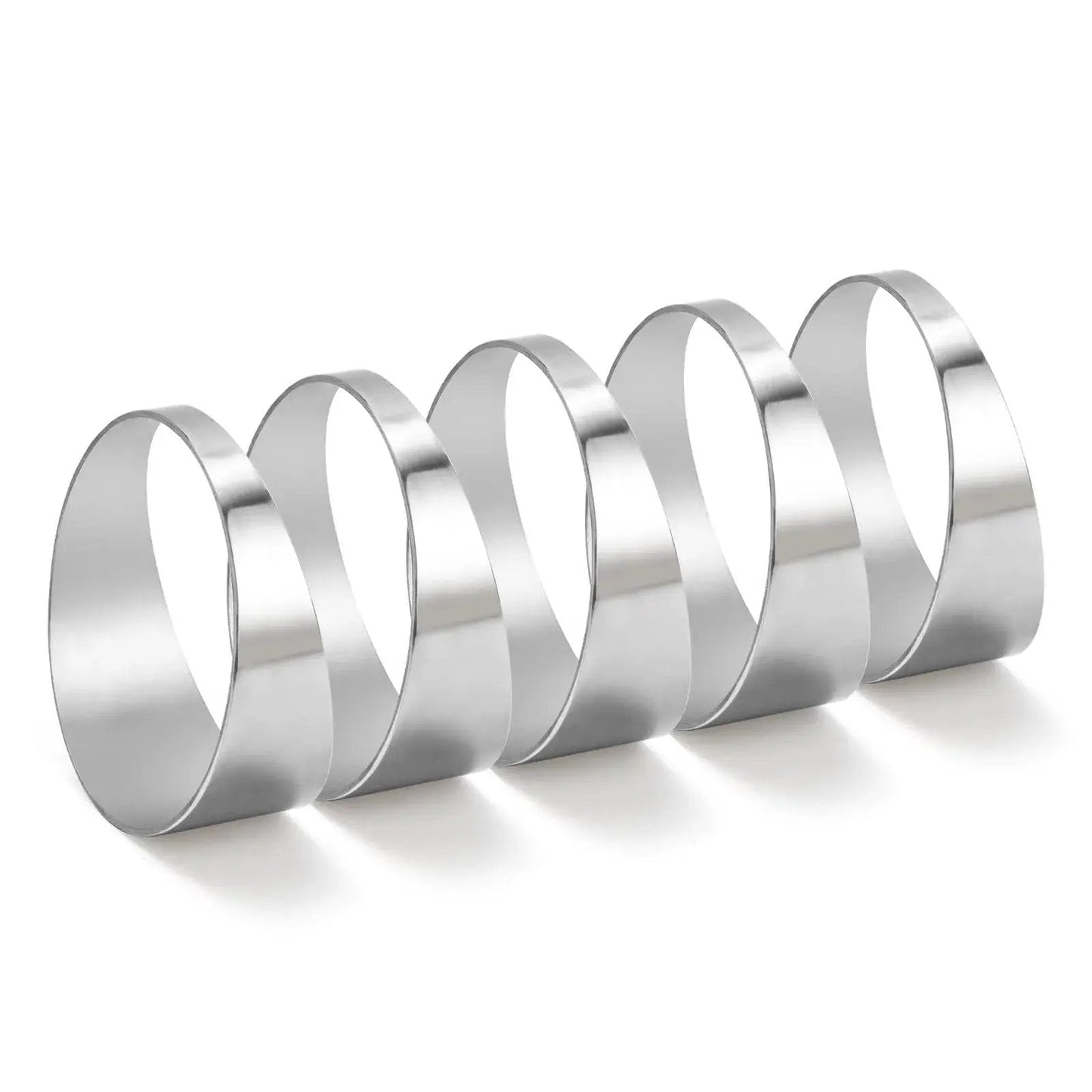 Five 304 Stainless Steel Pie Cuts 3 Inch Polished Deburred Exhaust Cutouts, shown from a side angle, in a row