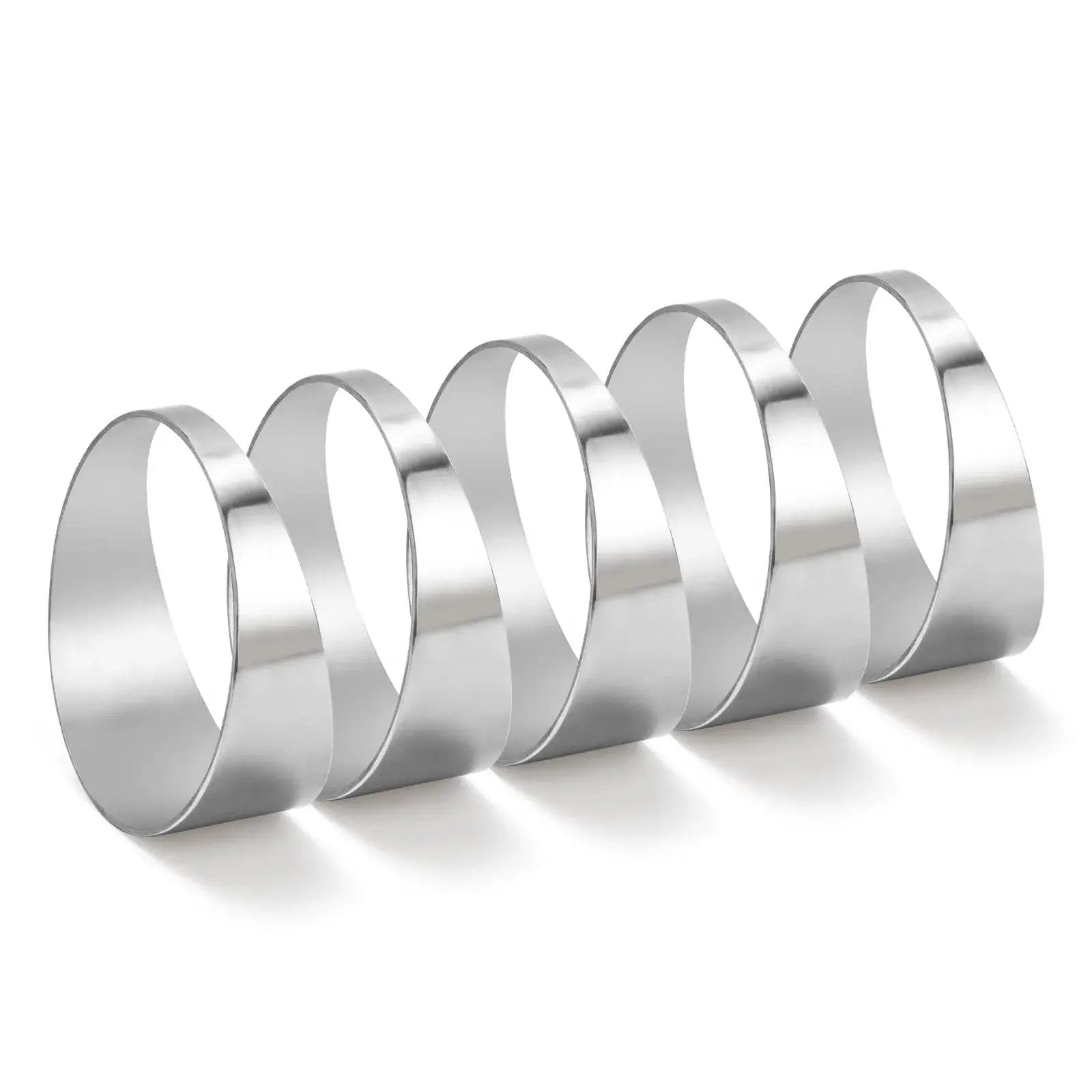 Five 304 Stainless Steel Pie Cuts 3 Inch Polished Deburred Exhaust Cutouts, shown from a side angle, in a row
