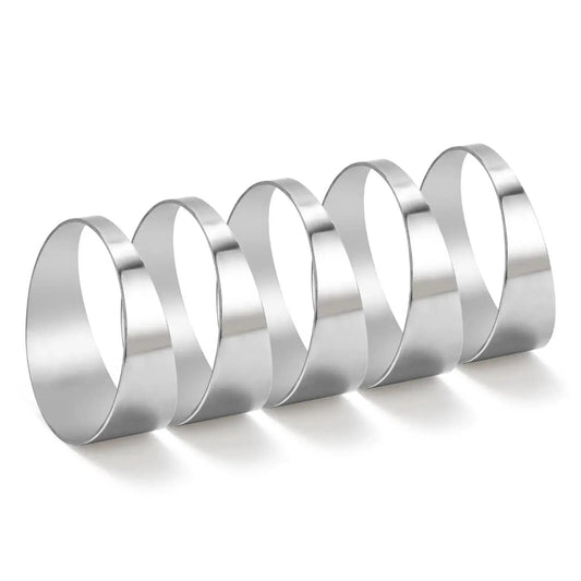 Five 304 Stainless Steel Pie Cuts 3 Inch Polished Deburred Exhaust Cutouts, shown from a side angle, in a row