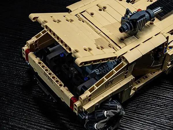 Rear view of Off Road Hummer Armor RC Car Kit With 804 Pieces For A Technic Style Build showing open trunk and 4WD Mecanum wheels.