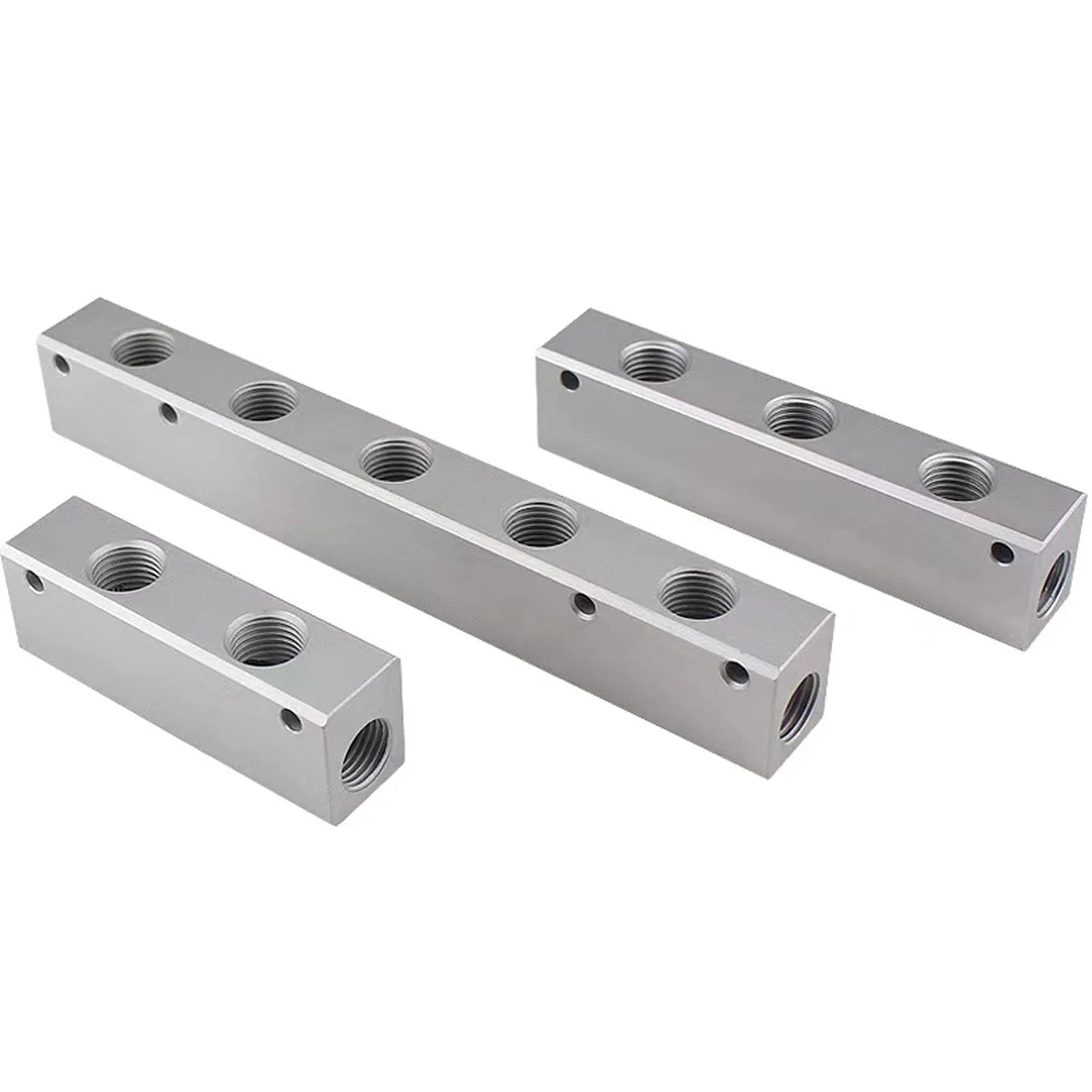 Three aluminum alloy blocks for Two Way Pneumatic Manifold Air Distribution Block With G1/2 Inlet Ports And G1/4 Outlet Ports, side view.