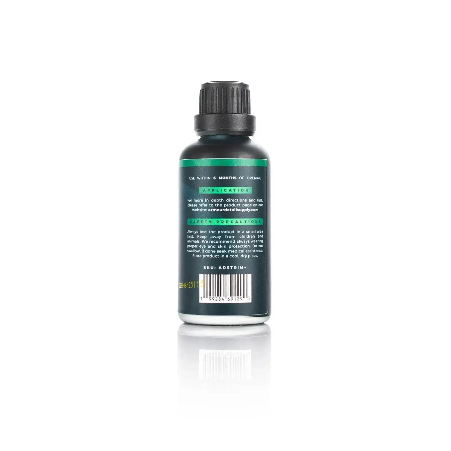 Back view of Trim And Exterior Plastic Restorer With UV Protection Up To 2 Years 50 Ml bottle showing label and barcode