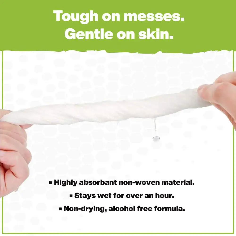 Person holding Plant Based Grill Cleaning Wipes Aloe And Vitamin E Safe On Surfaces Large 15X10, demonstrating absorbency