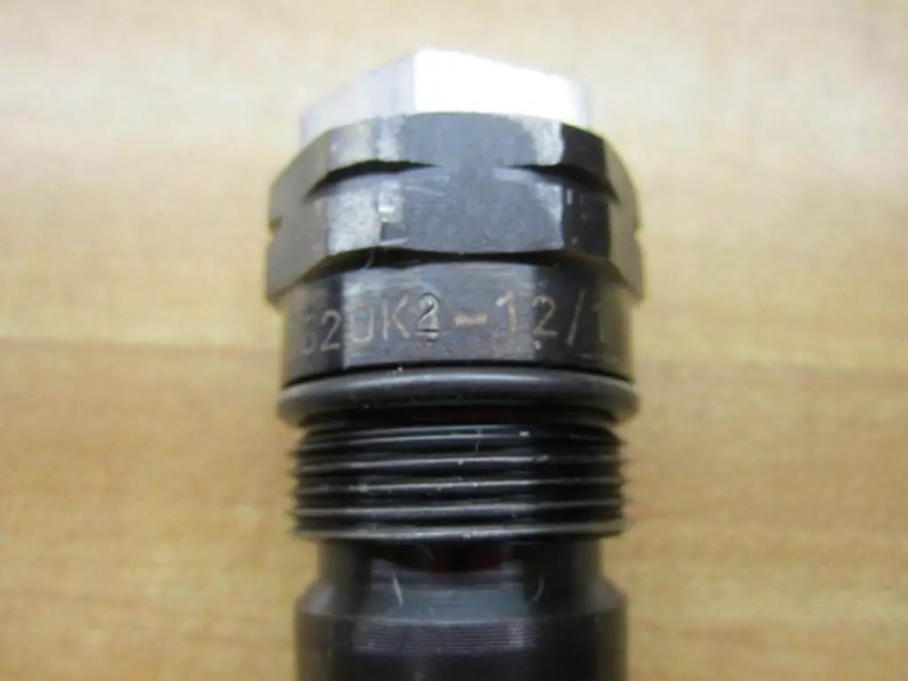 Bosch Rexroth D620K2-12/100XYV Hydraulic Control Valve close-up showing part details and threading for industrial applications.
