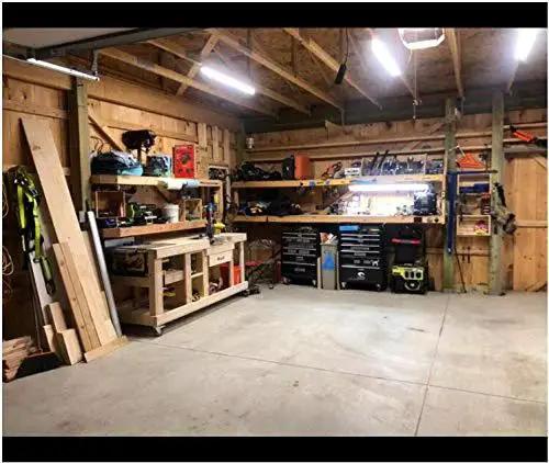 Workshop with tools and workbench featuring 2 Inch Caster Wheels Set Of 4 With 360 Degree Swivel And Brakes Lockable Bearing Plate Casters