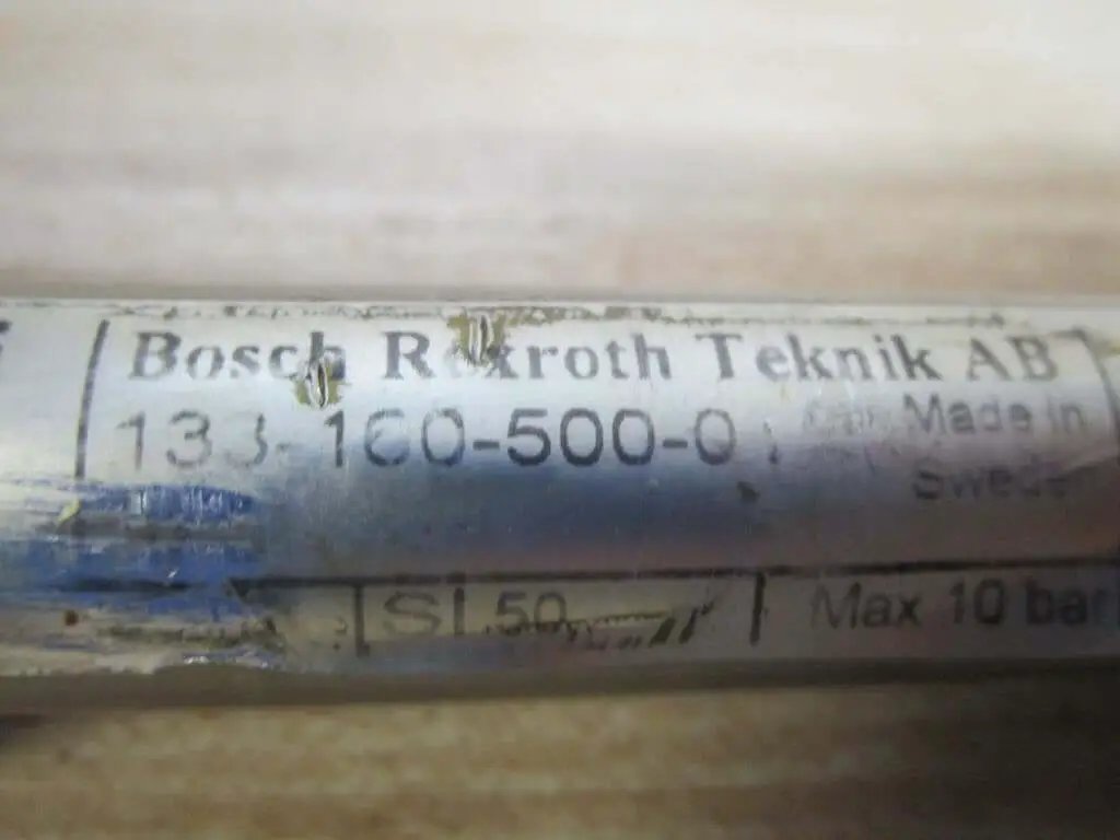 Close-up of Bosch Rexroth Teknik AB label on Industrial Hydraulic Cylinder 10mm Bore With Two And One Half Inches Stroke PN 13316050001.