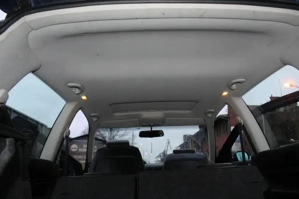 Car interior showing installed Mesh Headliner Fabric With Foam Backing For All Vehicles 60x40 In Light Grey
