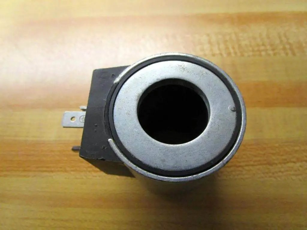 Top view of 24V DC Solenoid Coil Single Pack G745-4-A (G7454A) 18W for Hydraulic Valves, silver coil with black base.