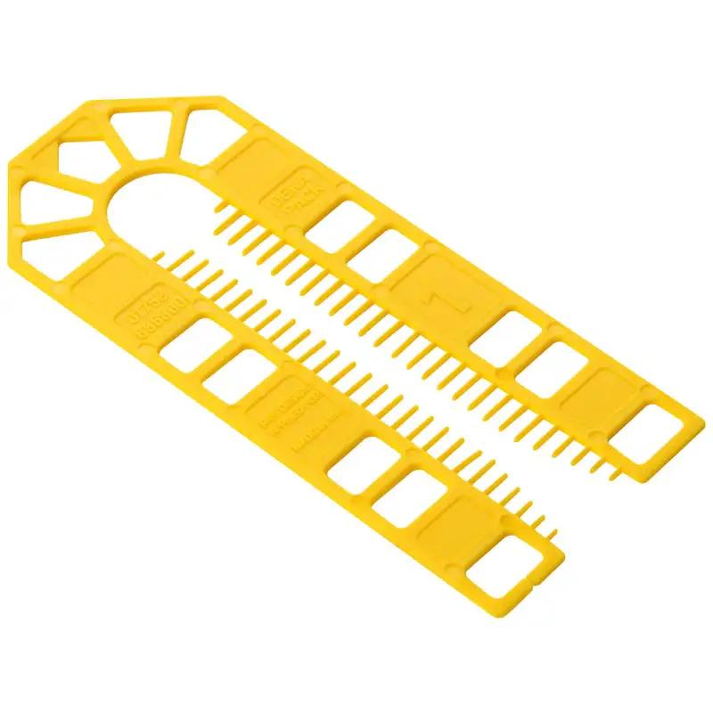 Flat Plastic Shim Set 60 Pack Multicolor for Leveling Cabinets and Furniture Durable DIY Spacers for Precise Fits Broadfix 60 Piece Pack, yellow plastic shims arranged flat.