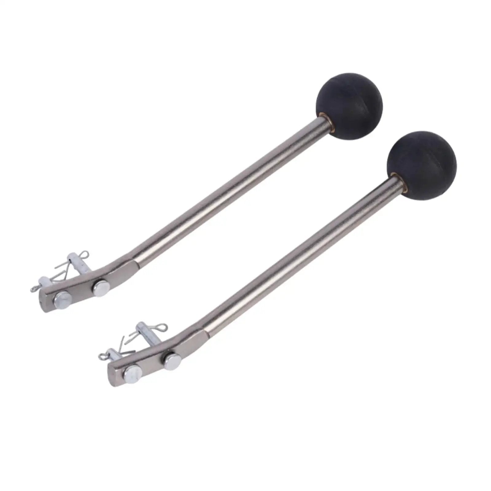 Pair of metal rods with black end balls, close-up view.